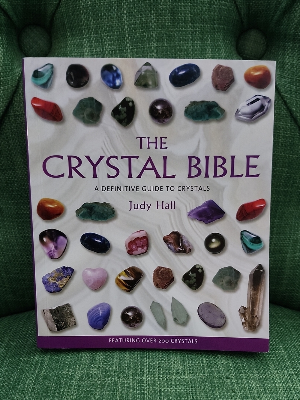The Crystal Bible by Judy Hall — White Cover with Multicolor Gem Images